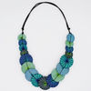 Azalea Necklace with large round multicolored blue wooden beads and thread accents