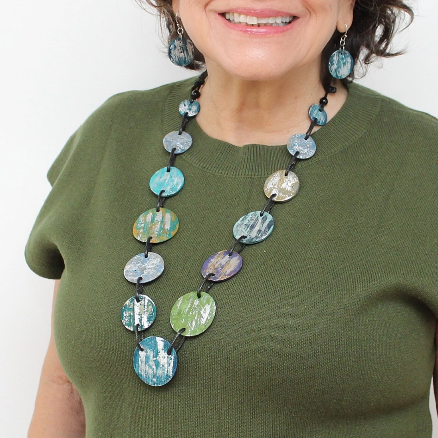 Model wearing the Maren Necklace with a neutral outfit