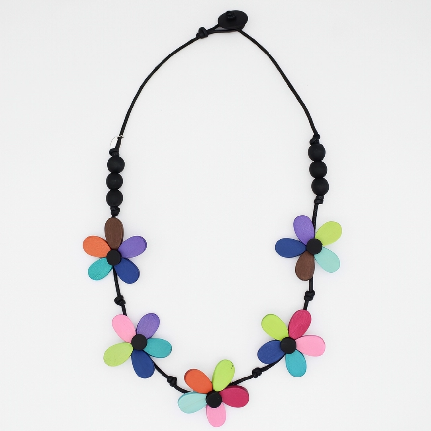 Model wearing Prismatic Petal Necklace with a neutral top