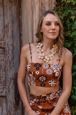 Full view of Lupita Necklace laid flat to show length and craftsmanship