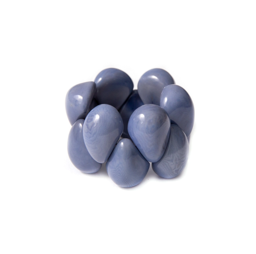 Raindrop Tagua Bracelet handmade in Ecuador, featuring sustainable materials in Azul Combo