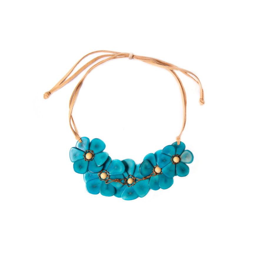 Rosalia Tagua Necklace featuring handmade floral tagua flowers and açaí berries in Ivory and Turquoise