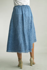 Comfortable stretch waist and frayed hem of Tempo Paris wrap skirt in the color Denim