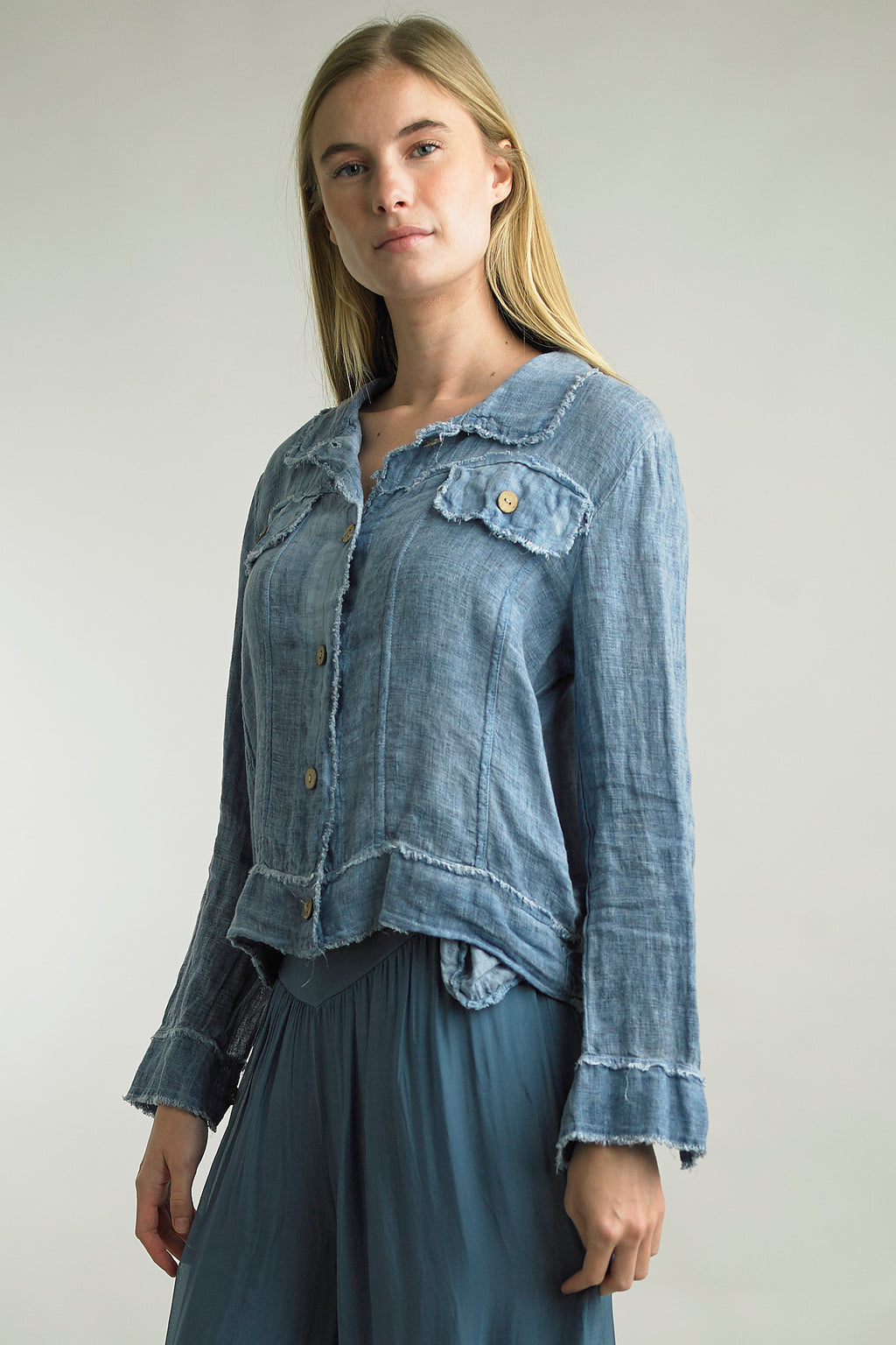 Front view of Tempo Paris Linen Jean Jacket with frayed edges in the color Denim