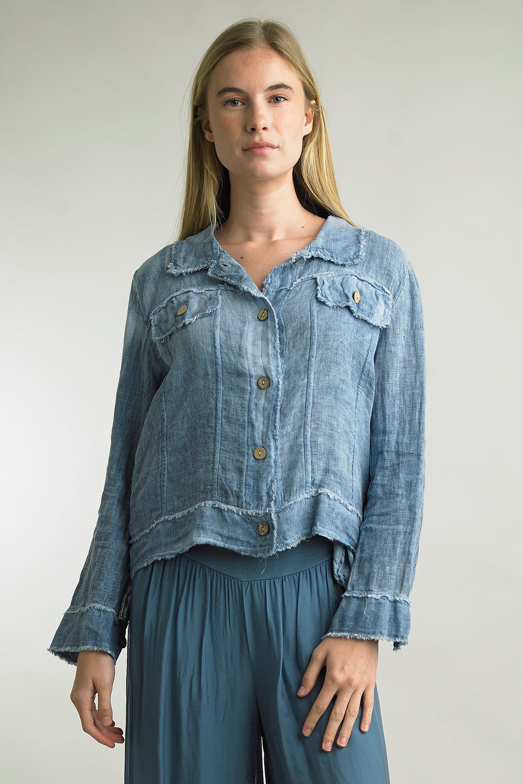 Front view of Tempo Paris Linen Jean Jacket with frayed edges in the color Denim