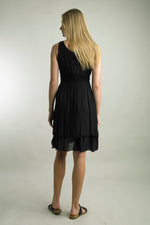 Back view of elegant sleeveless black midi dress by Tempo Paris