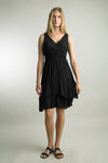 Model wearing black silk blend dress styled for a summer event