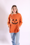 Pippa Holidays Sweater in oversized festive design with jack-o’-lantern motif.