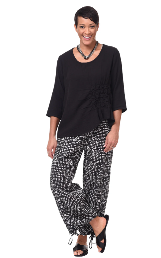 Model wearing Tulip Olga Gauze Top in a relaxed, casual outfit

