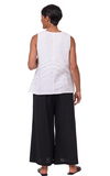 Back view of flowy cotton palazzo pants in natural light