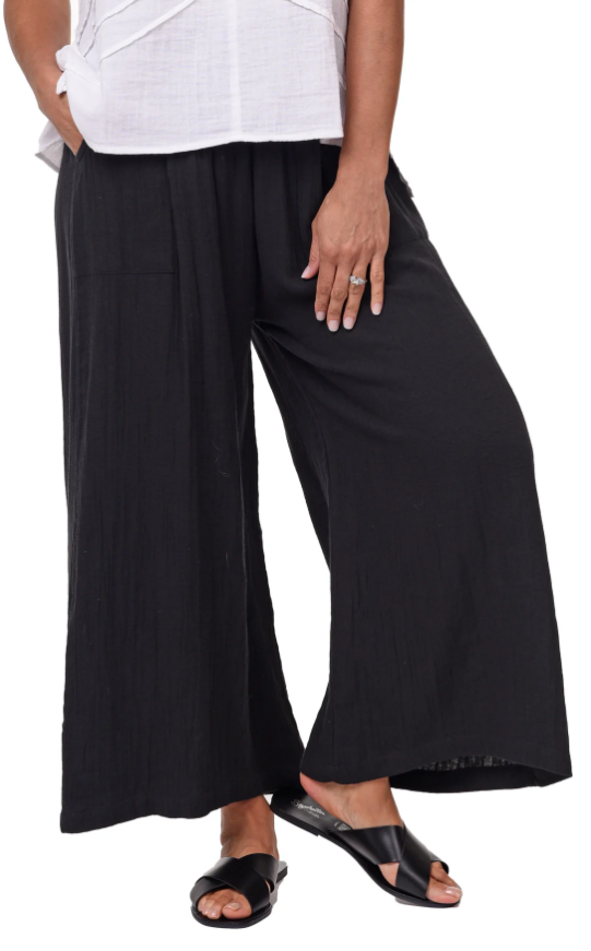 Model wearing Tulip Palazzo Pants styled with a breezy summer top