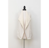 Soft sherpa vest with open front and exposed seams, made in the USA