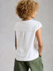 Breathable organic cotton top with relaxed regular fit in the color white at The Lazy Daisy