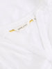 Women’s summer top with notch neck and embroidered detail in the color white at The Lazy Daisy