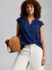 Woman wearing Amelia embroidery top by White Stuff in the color Blue Indigo at The Lazy Daisy