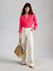 Organic cotton collared shirt with 3/4 sleeves in the color Bright Pink at The Lazy Daisy