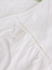Feminine organic cotton top with delicate embroidery detail in the color White at The Lazy Daisy