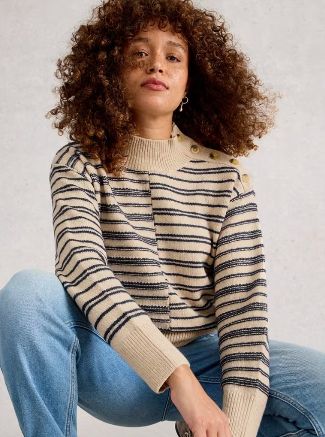 Model wearing Mix Stripe Sweater in high-neck striped design