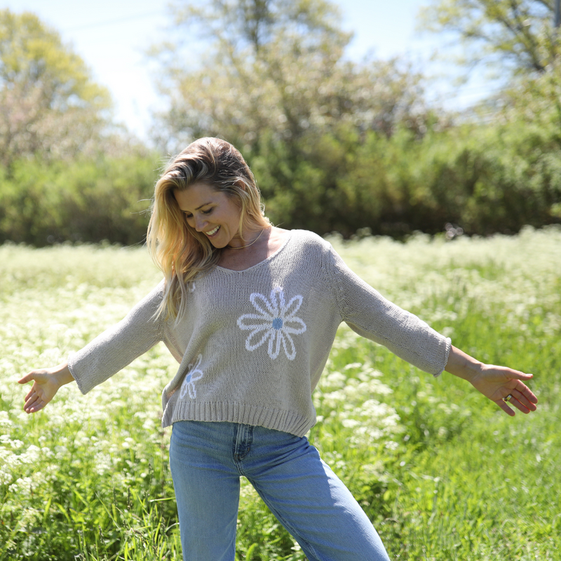Side view of Wooden Ships Meadow sweater showing ribbed hem and side slit
