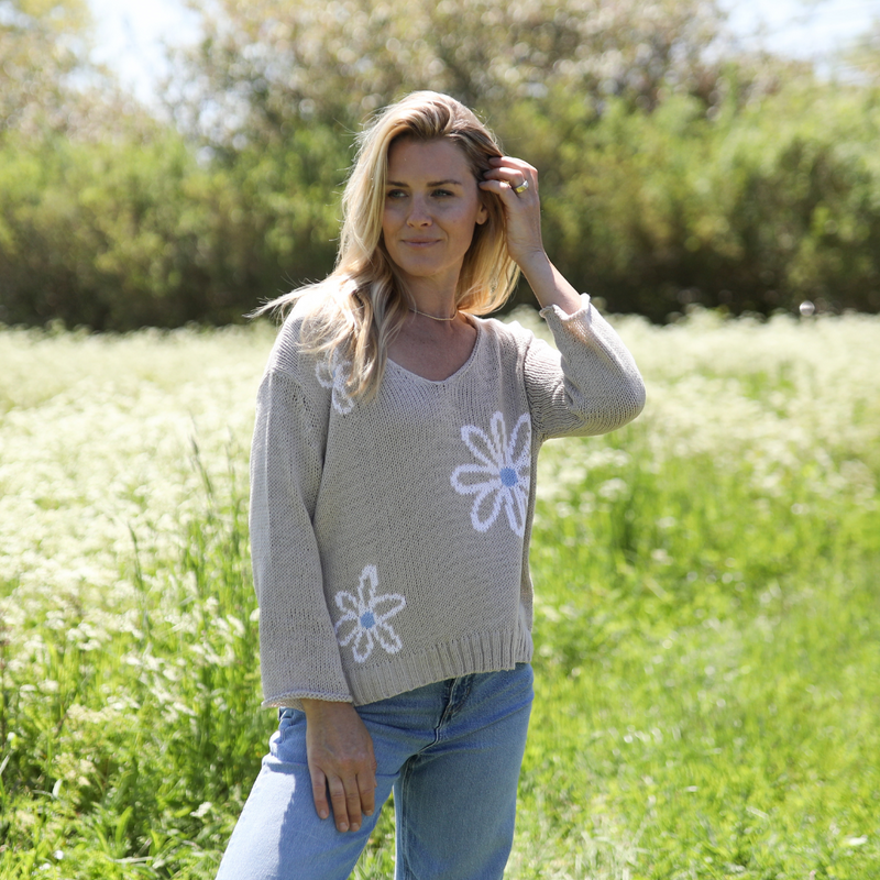 Side view of Wooden Ships Meadow sweater showing ribbed hem and side slit