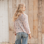 Back view of Wooden Ships knit top styled by The Lazy Daisy Boutique