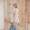 Model wearing The Lazy Daisy’s Wooden Ships cropped knit sweater