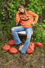 Jack-O-Lantern Stripe Crew sweater with knit pumpkin face and stripes