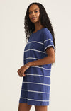 Side view showing relaxed fit and short sleeves