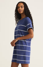 Side view showing relaxed fit and short sleeves