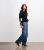 Model wearing Avery Sweater with drop shoulder design and center seam